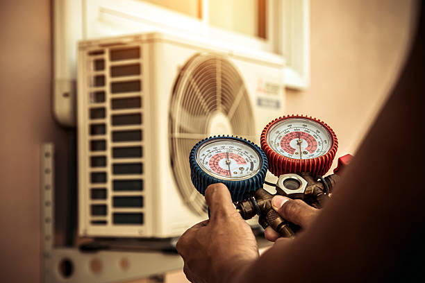 Professional Heat Pump Repair technician working in Double Springs, AL